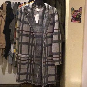 Manteau/la. Size L Outrageous knit am cardi